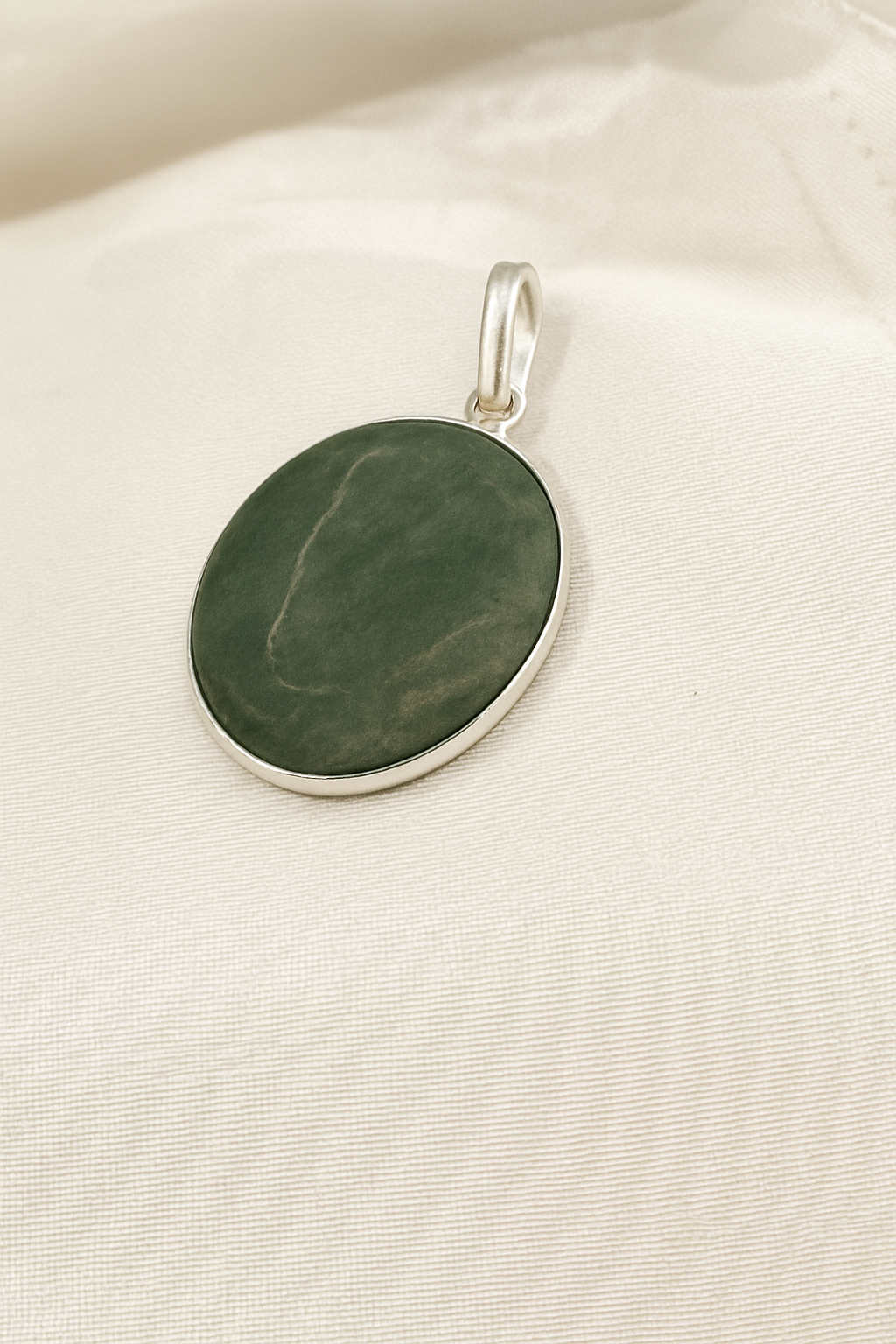 Green Jade Oval Pendant - Stone of Abundance & Harmony